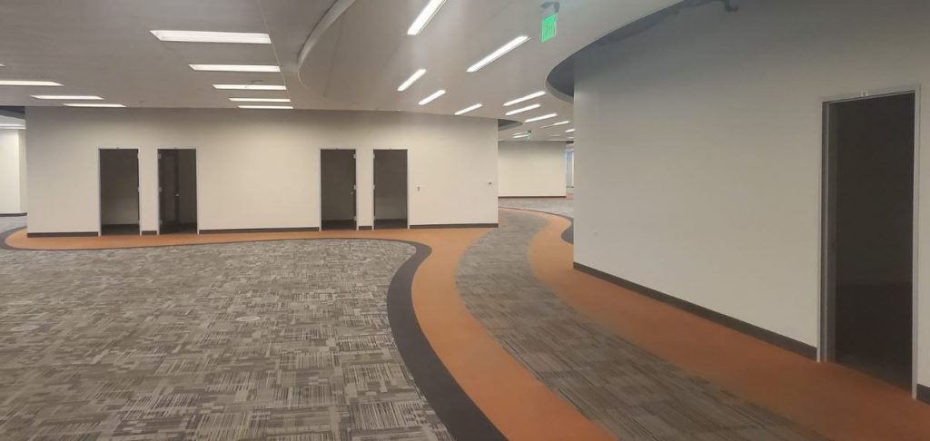 renovated and clean repaint of an office building walk area
