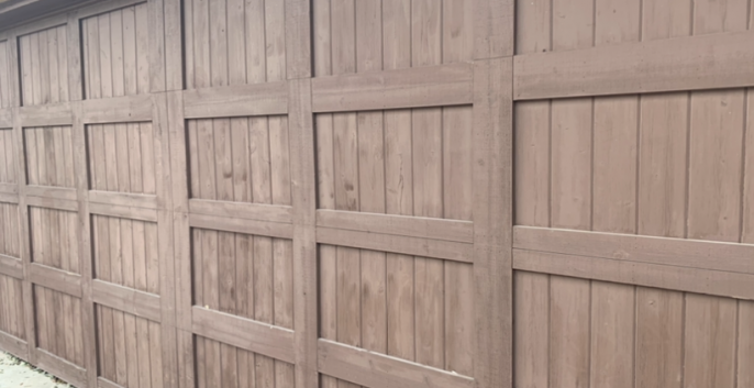 Garage Door Before the Refinished Look - faded wood color