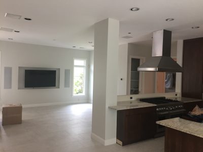 Interior kitchen and living room painting by CertaPro house painters in Austin, TX