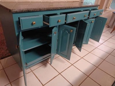 Teal painted Cabinets