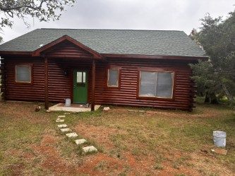 log cabin in Llano, TX