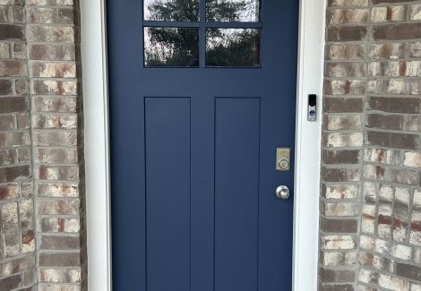 navy blue painted front door of home