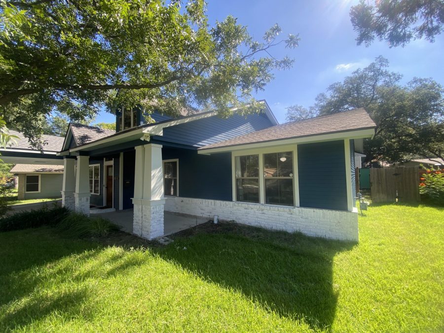 front corner of blue house with white trim and covered front porch Preview Image 1