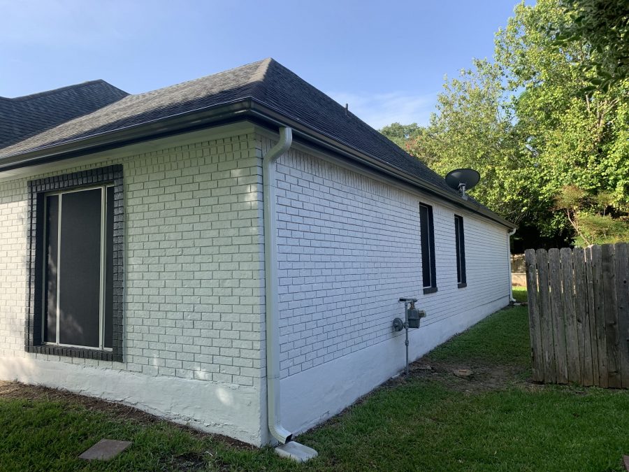 back corner of home with white painted brick Preview Image 1
