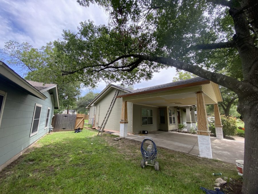 driveway with ladder leaning against portico roof Preview Image 10