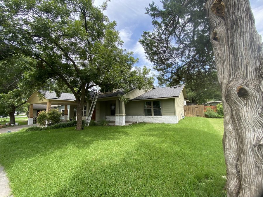 back yard and house with yellow siding Preview Image 13