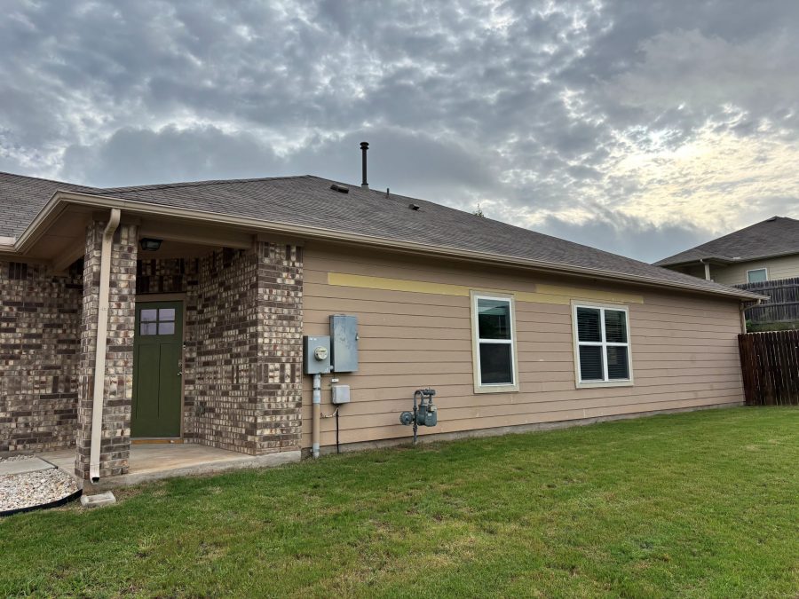 front corner of house with stone and tan siding Preview Image 3