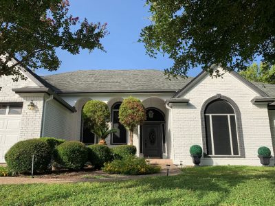 white painted brick home