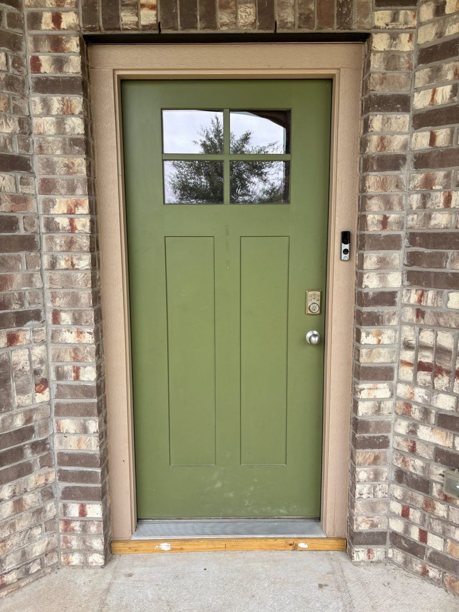 green painted front door of house Preview Image 13
