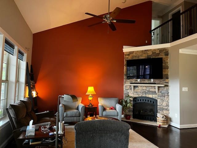 dark orange living room after painting