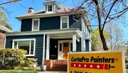 blue home exterior after painting with certapro sign