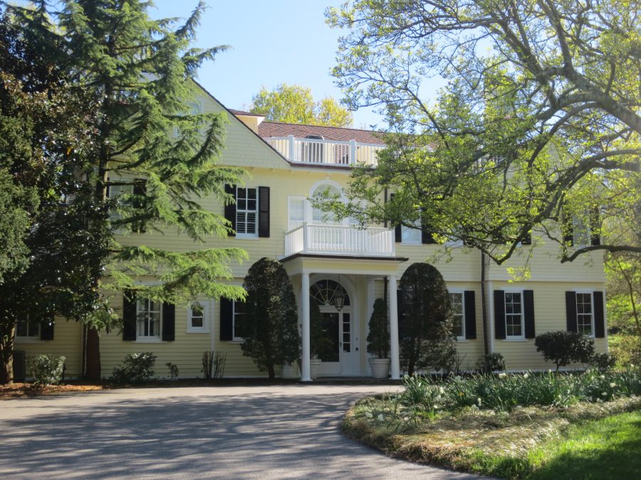 Residential Exterior Painting - Pale Yellow with White Trim and Black Shutters