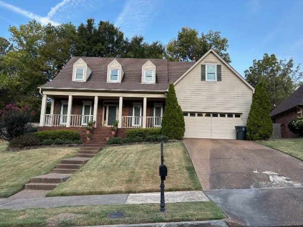 house with beige siding before repaint Preview Image 1
