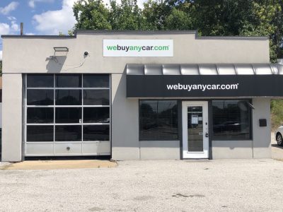 Front of WeBuyAnyCar in Belleville, IL, after completed commercial exterior painting project by CertaPro Painters of Belleville, IL