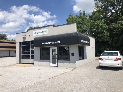 Front Angle of WeBuyAnyCar in Belleville, IL, after completed commercial exterior painting project by CertaPro Painters of Belleville, IL - Angle 2