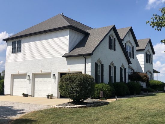 Completed Residential Exterior Brick Painting project by CertaPro Painters of Belleville - White color bricks
