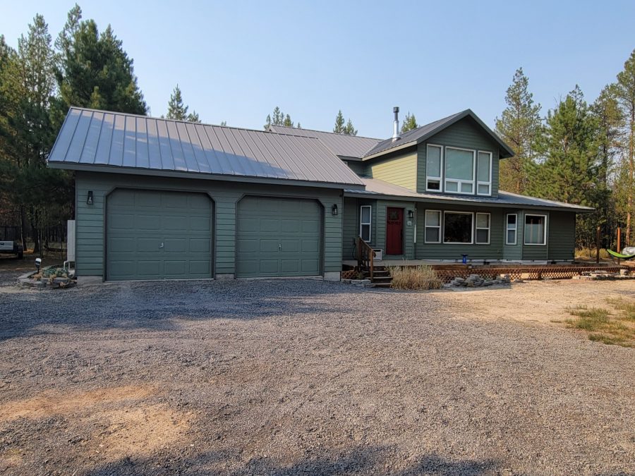 Repainted home exterior and garage in La Pine, Oregon Preview Image 1