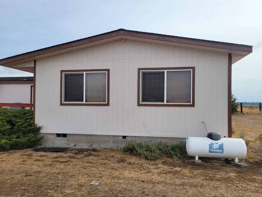 Photo of side of exterior home repainted in Powell Butt, Oregon Preview Image 2