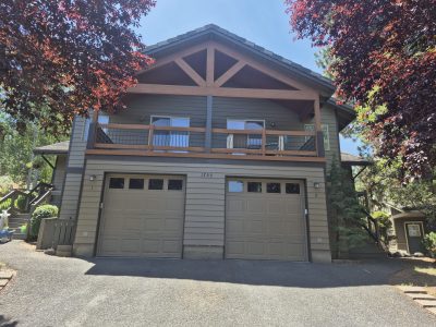 repainted garage doors and siding in Madras, OR