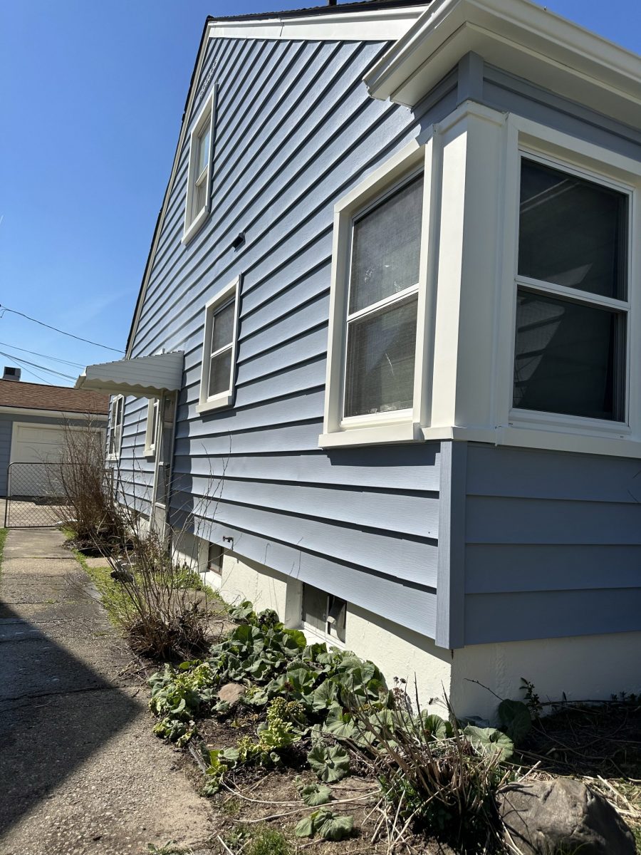 Blue house siding exterior paint refresh Preview Image 1