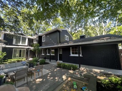 exterior of home in blue siding
