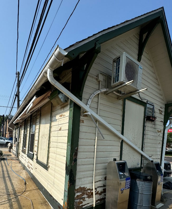 ticket office exterior painting before