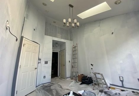 interior room with skylight before painting
