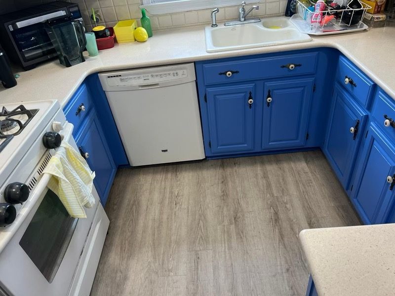 kitchen cabinets after painting blue Preview Image 2