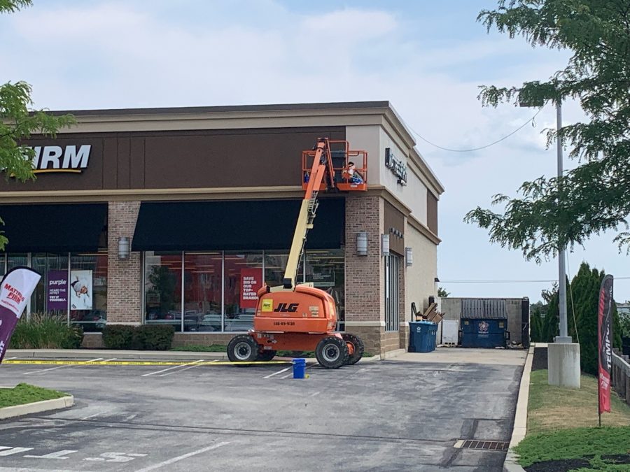 Large Retail Building Painting With a Crane Preview Image 1