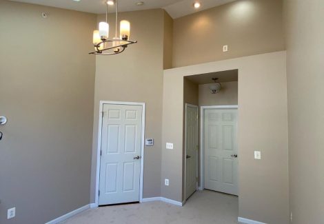 interior room with skylight painting