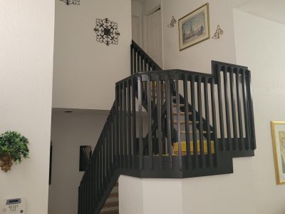 black painted wooden staircase banister