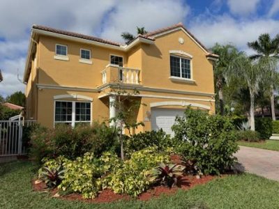 tan and white exterior of house boca raton fl house painters