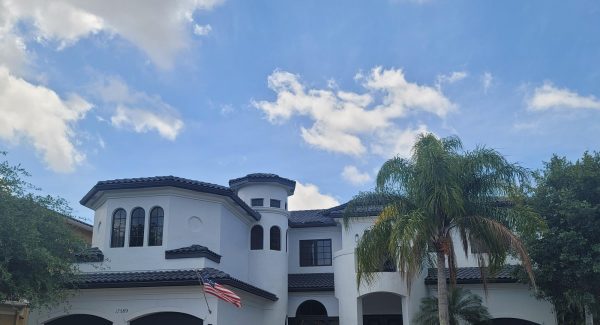 white and black painted house exterior