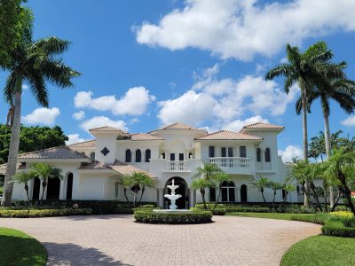 painted exterior of big white house in boca raton fl