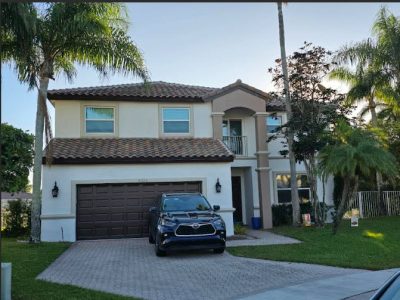 painted brown roof boca raton painting company