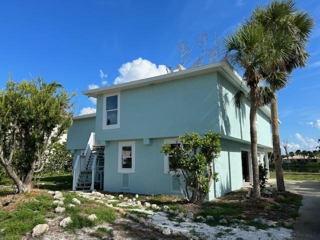 blue & white painted house Preview Image 3