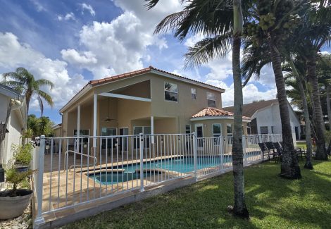 Back of House & Aluminum Railing Fence