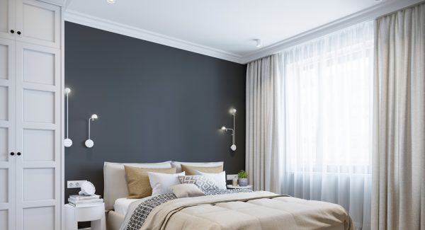 bedroom with blue accent wall