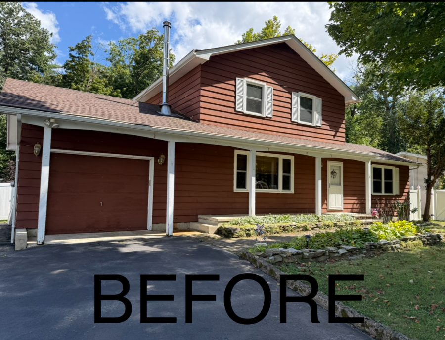 red vinyl siding on home Preview Image 1