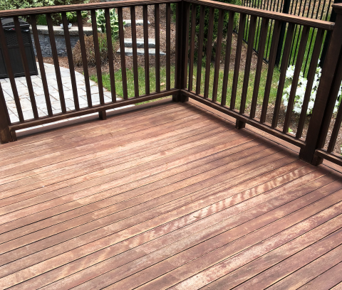 Faded mahogany deck with darker railings