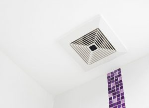 painted ceiling with bathroom fan and purple tile
