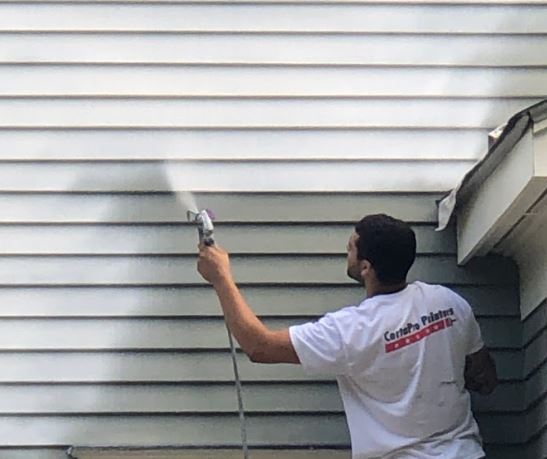 How To Spray Paint Your House's Exterior With An Airless Sprayer