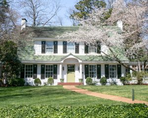 White colonial home in the springtime.