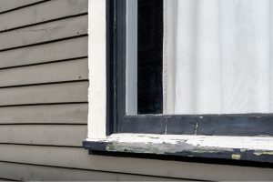 window with peeling white paint