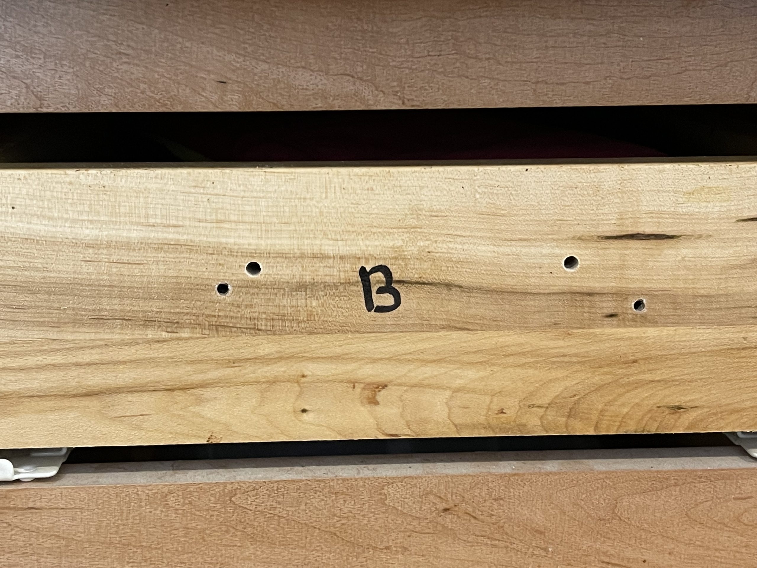 Wooden-drawer face with the letter B