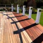 mahogany deck half stained and half raw wood at South Shore Country Club in Hingham, Massachusetts