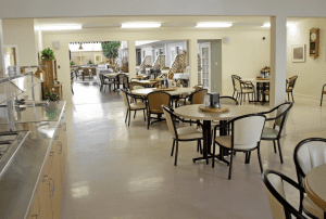 Interior of assisted living facility's dining room.