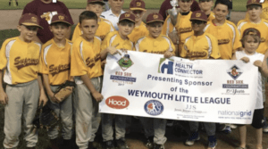 Weymouth Little League Team holding up sponsorship banner