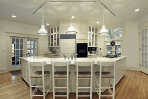 White kitchen with 4 island chairs