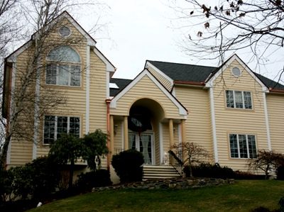 Exterior house painting by CertaPro painters in Marshfield, MA